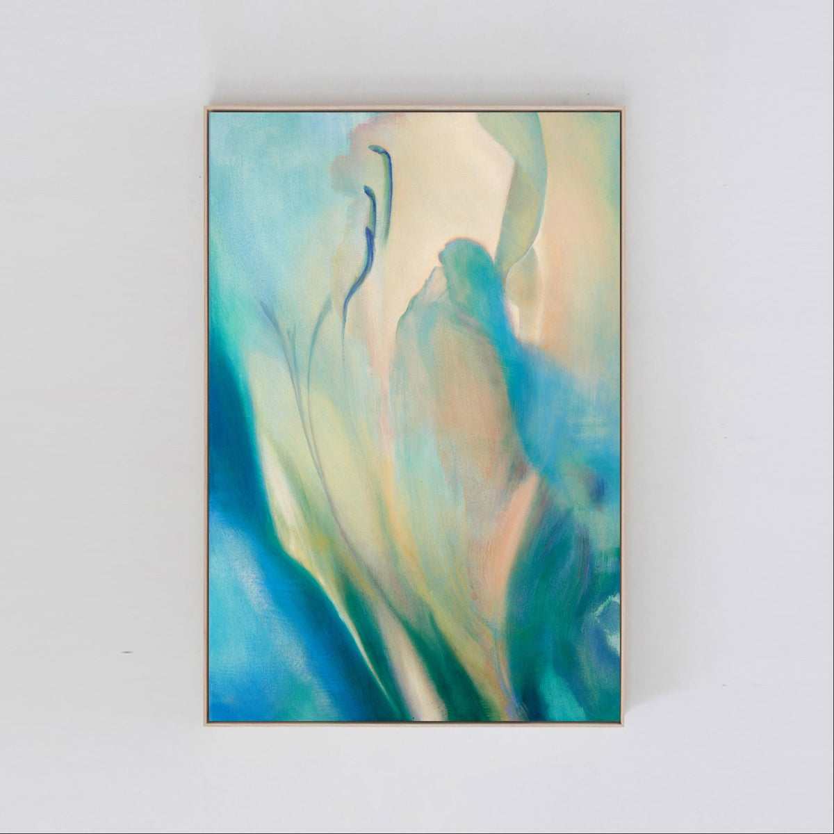 Abstract floral painting with swirling blue and green colors on a white wall.