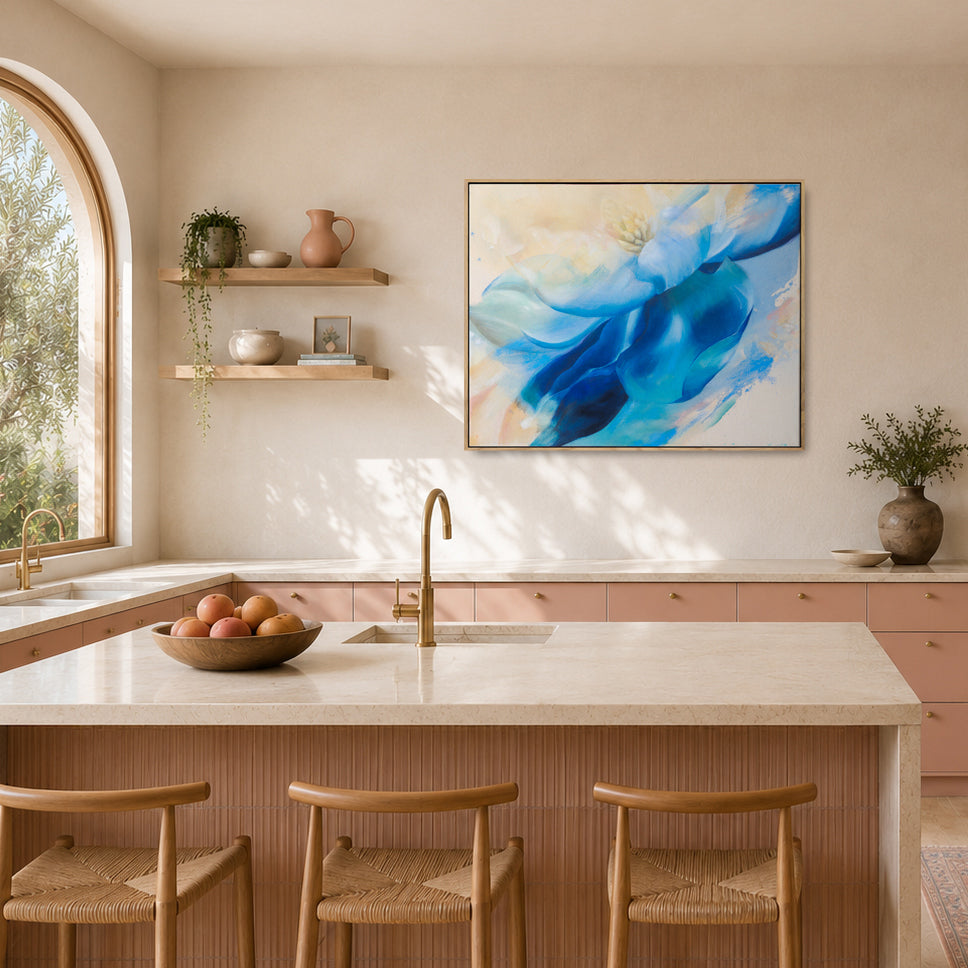 Modern kitchen with original framed abstract blue painting on the wall.